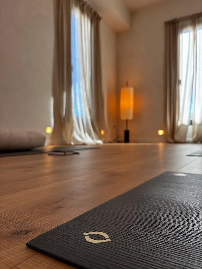 Close-up of YogaBond mat on wooden floor