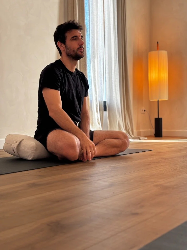 Seated meditation with bolster at YogaBond studio